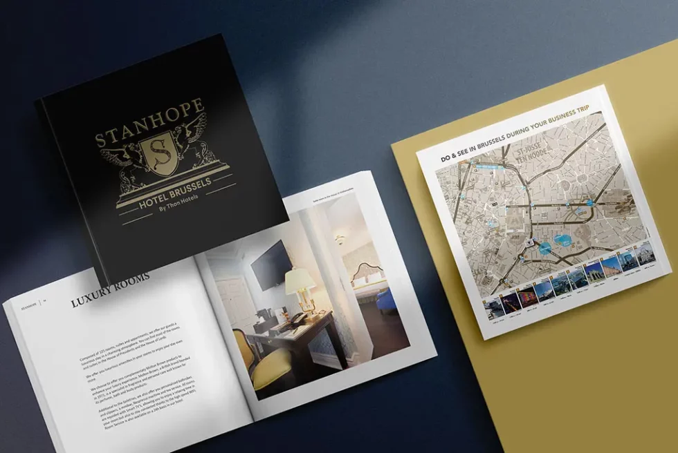 Couverture et pages intérieures d'un livre conçu pour un hôtel de luxe.